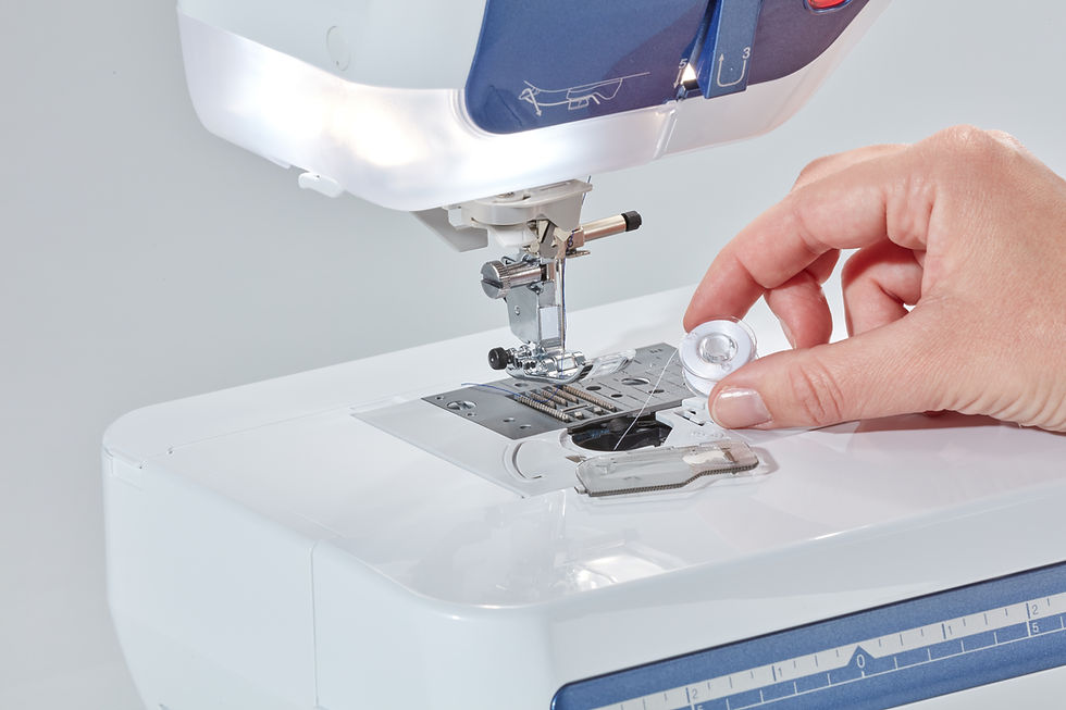 Thumbnail: Drop in bobbin on the Brother inno-vis V5LE sewing machine