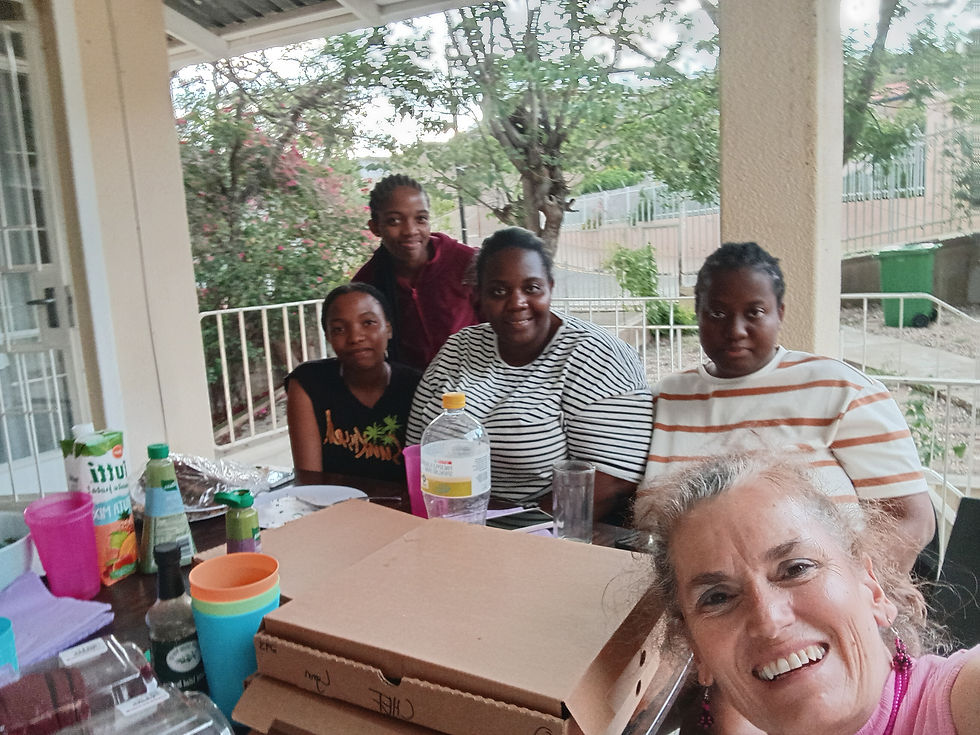 My housemates and friends at a pizza party