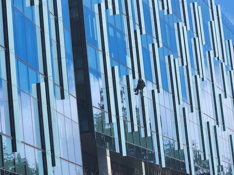 Morris Hansen High Access Team Cleaning windows from Bosun chair on 2/12/2024 at Microsoft located in Esterra Park in Redmond, WA.