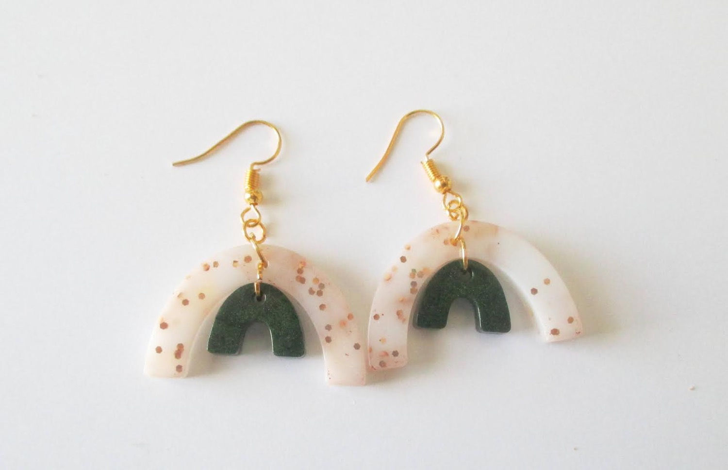 White, gold and forest green nested arches