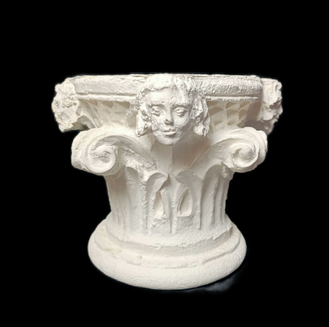 Chapiteau à quatre têtes d'hommes | XIIe siècle