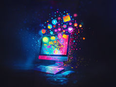 Imagem de um iMac com explosão de cores e ícones digitais representando o impacto do marketing digital, simbolizando como o OVNI Estúdio Criativo transforma criatividade e estratégia em resultados reais.