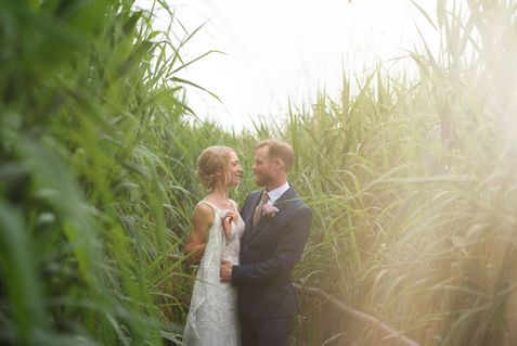 A sunlit portrait among tall plants — OL and JULIE wedding