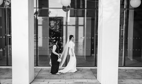 Lesley Ann outside the glass entrance to Sunderland City Hall