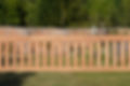wooden bench with engraved message in garden