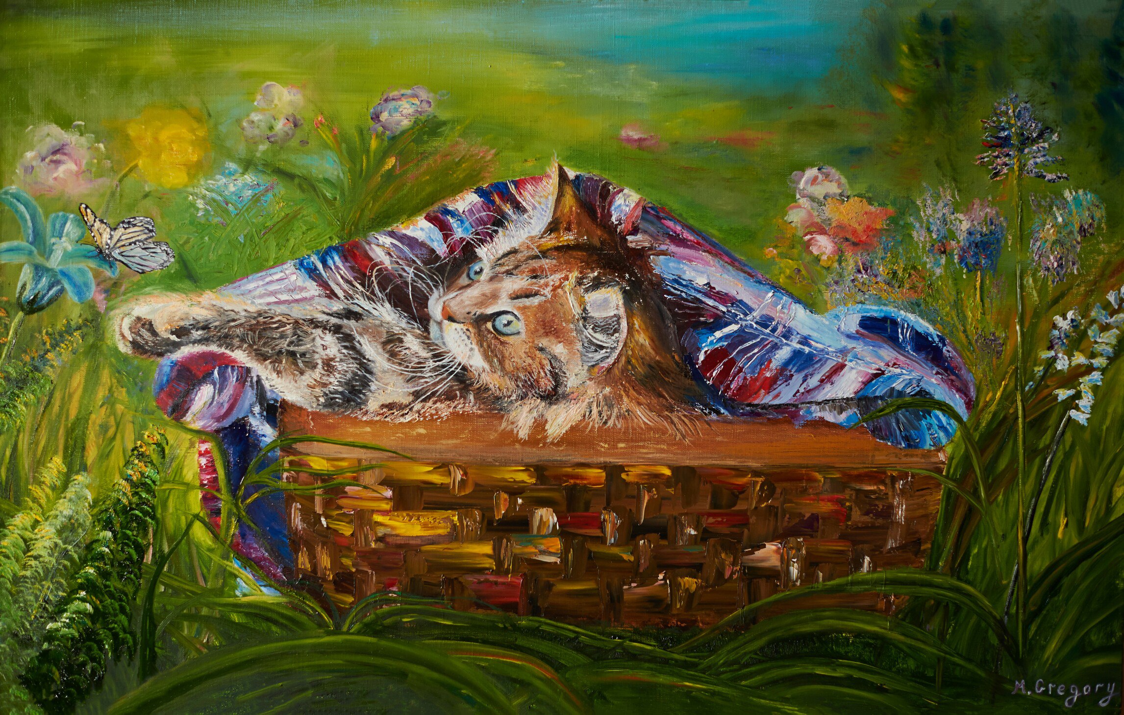 Котенок в корзине