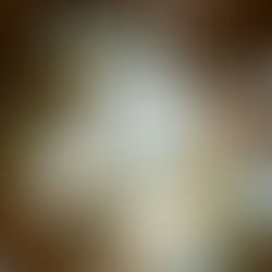 Wine Glasses And Pictures On Table