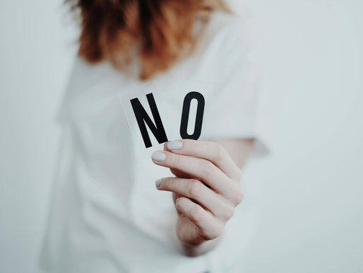 A women holding the word No