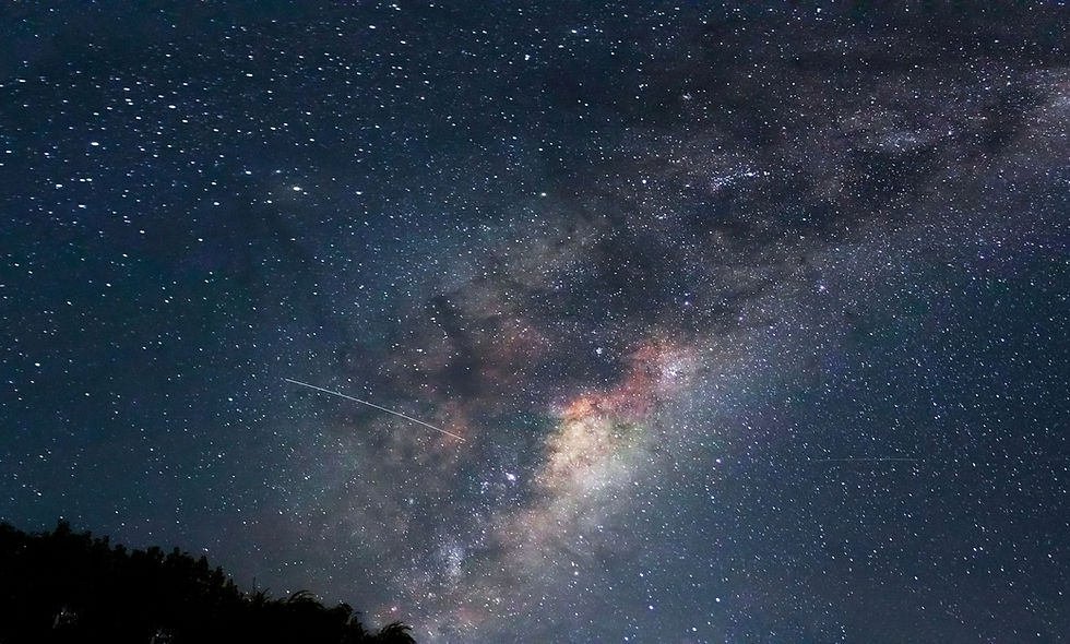 Captivating view of the Milky Way galaxy with shooting stars and cosmic dust