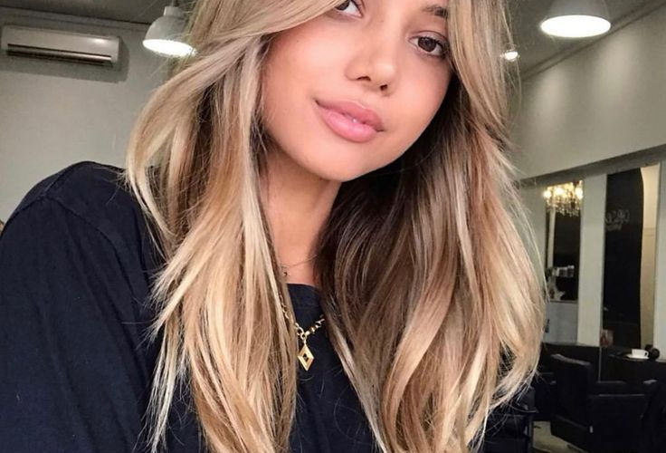 pretty girl with grown grown out fringe