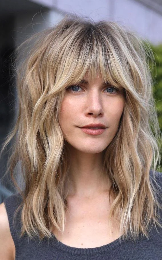 pretty girl with grown grown out fringe