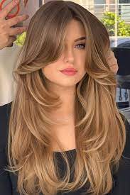 girl with long haircut with face framing layers 