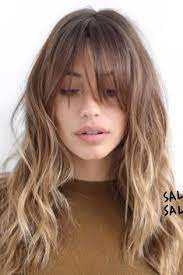 pretty girl with grown grown out fringe