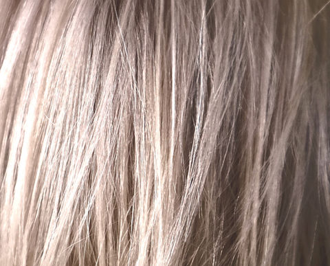 abstract close up of blonde hair showing texture