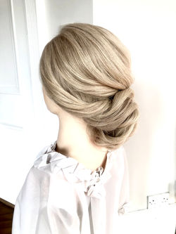 Elegant soft Undo for your Wedding day, this soft Style is a timeless elegant look for your Wedding 
