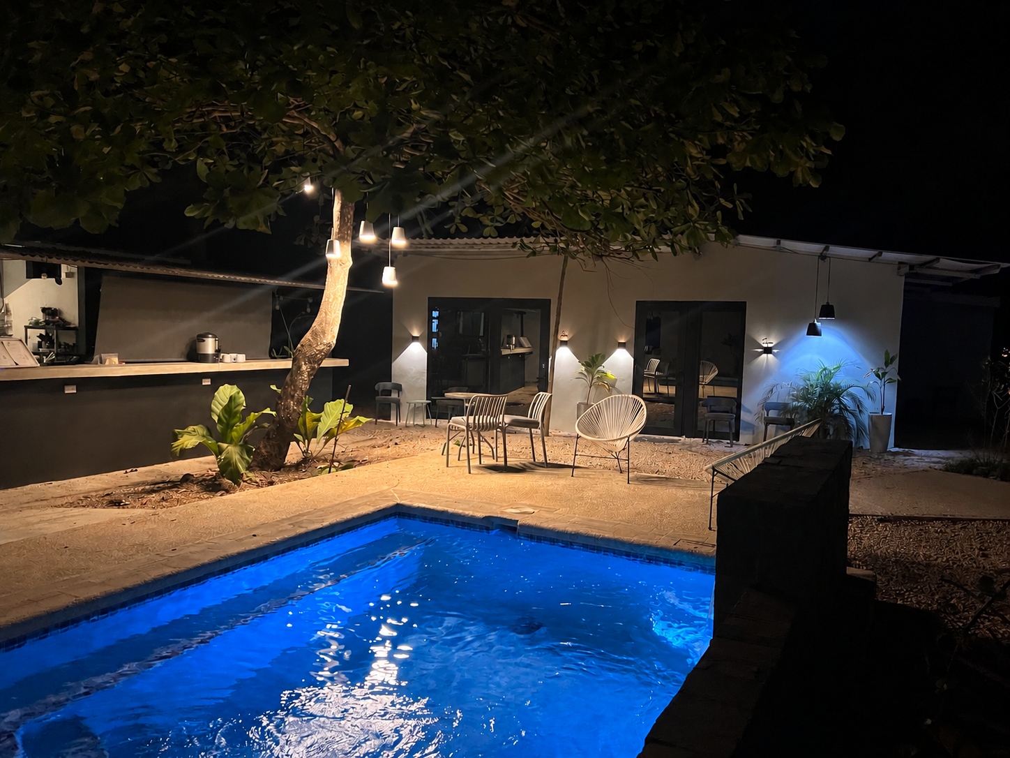 Sueño Mono pool illuminated at night