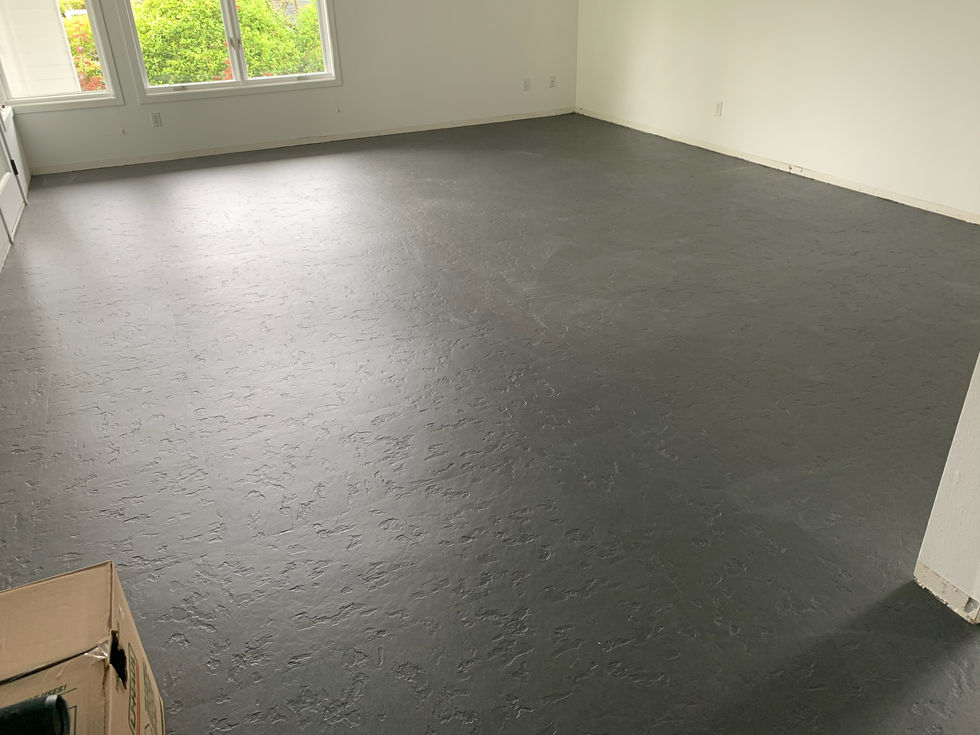 Marmoleum MCT tile with embossed concrete pattern installed in a kitchen. Work completed by Linoleum Pros, Forbo Certified Installers.