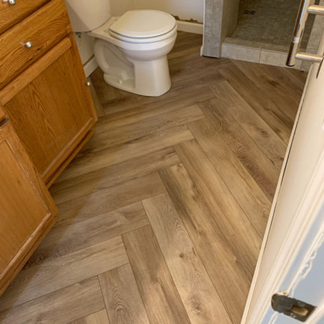 Gaia herringbone LVP plank installed on floor