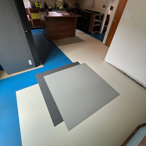 Forbo Marmoleum sheet installed on kitchen floor with custom pattern