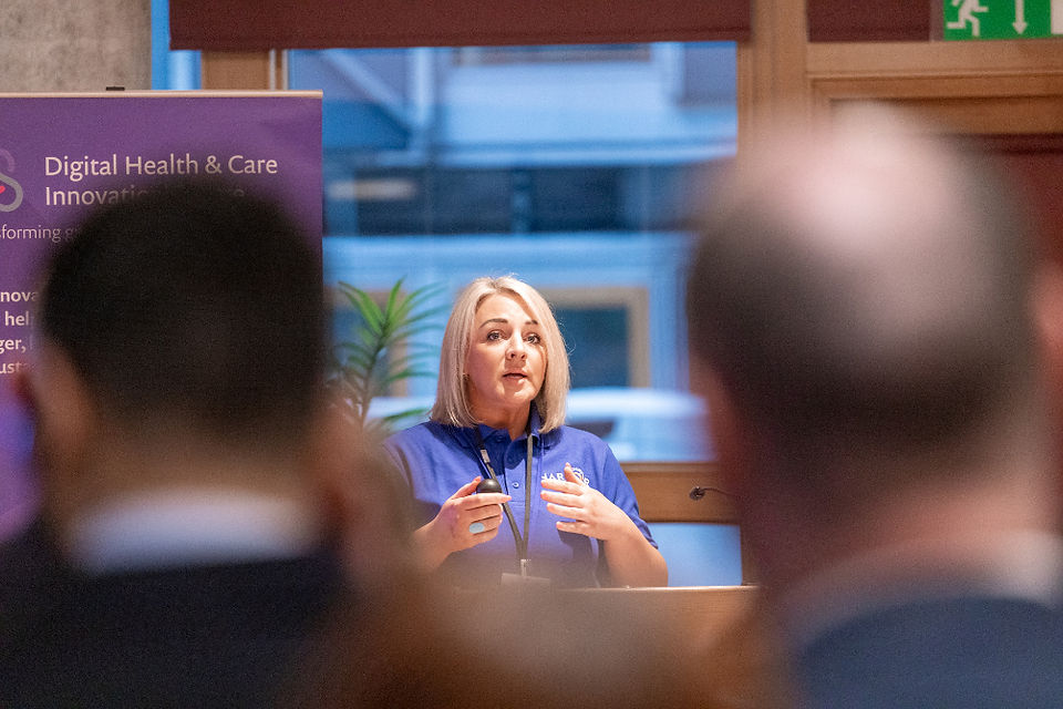 Vari MacFadzean presenting at Digital Lifelines Scotland Parliamentary Reception