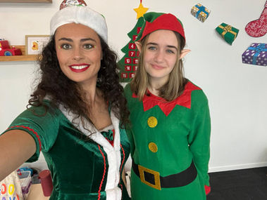 elves playing games during corporate christmas entertainment family day