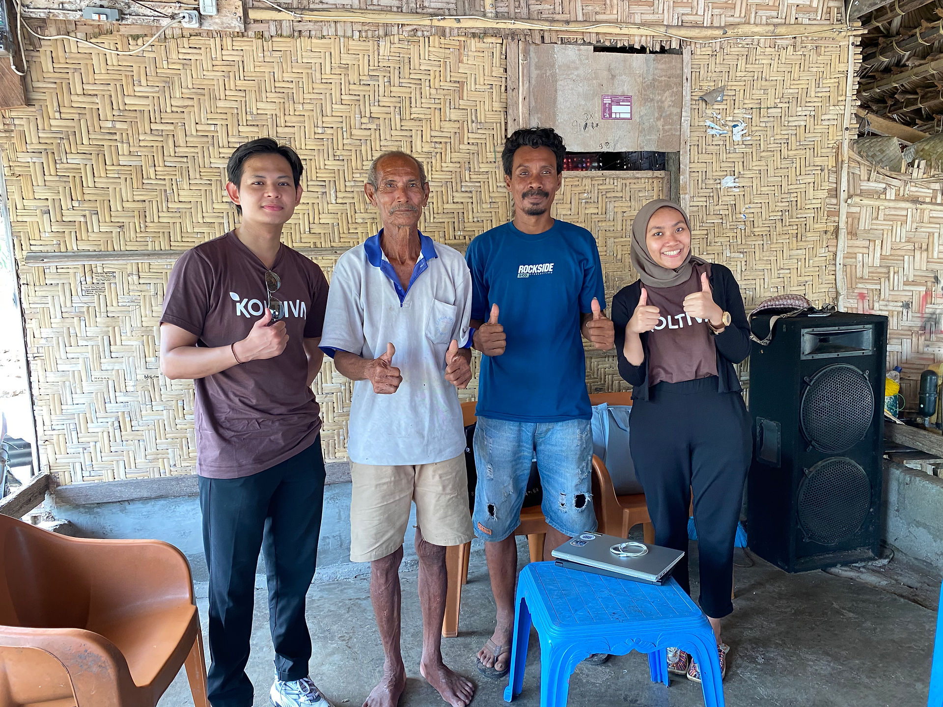 Koltiva field officer training seaweed farmers on digital tools for sustainable practices.
