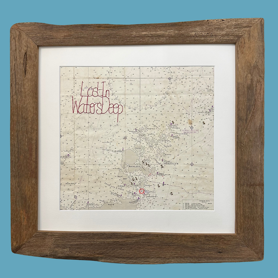 Vintage maritime map of the Orkney Isles with logos and anchors stitched onto it and the worlds 'lost in waters deep'