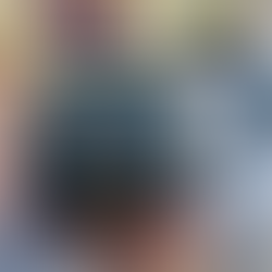 Blue glazed ceramic mug on wooden table