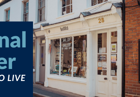 Photograph of Manningtree High Street with a banner overlaid with text 'Regional Winner Best Place to Live in the East' with the Times newspaper logo