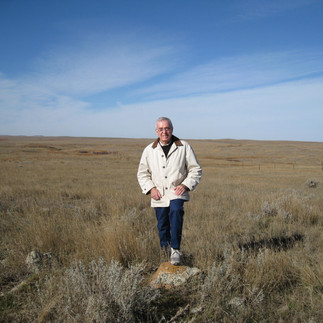 Senior athlete Pete Sutton walking in South Dakota field
