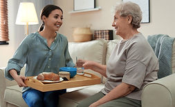 Young-Woman-Serving-Dinner (1).jpeg