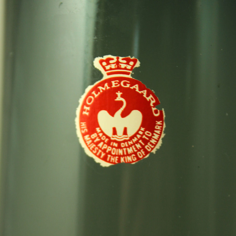 Thumbnail: Originnal label on the teal vase.