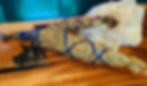 Smudge sticks wrapped in thread with Quartz crystals
