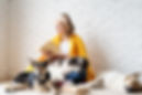 pet-care-funny-smiling-young-woman-yellow-plaid-sitting-with-her-dogs-reading-book.jpg