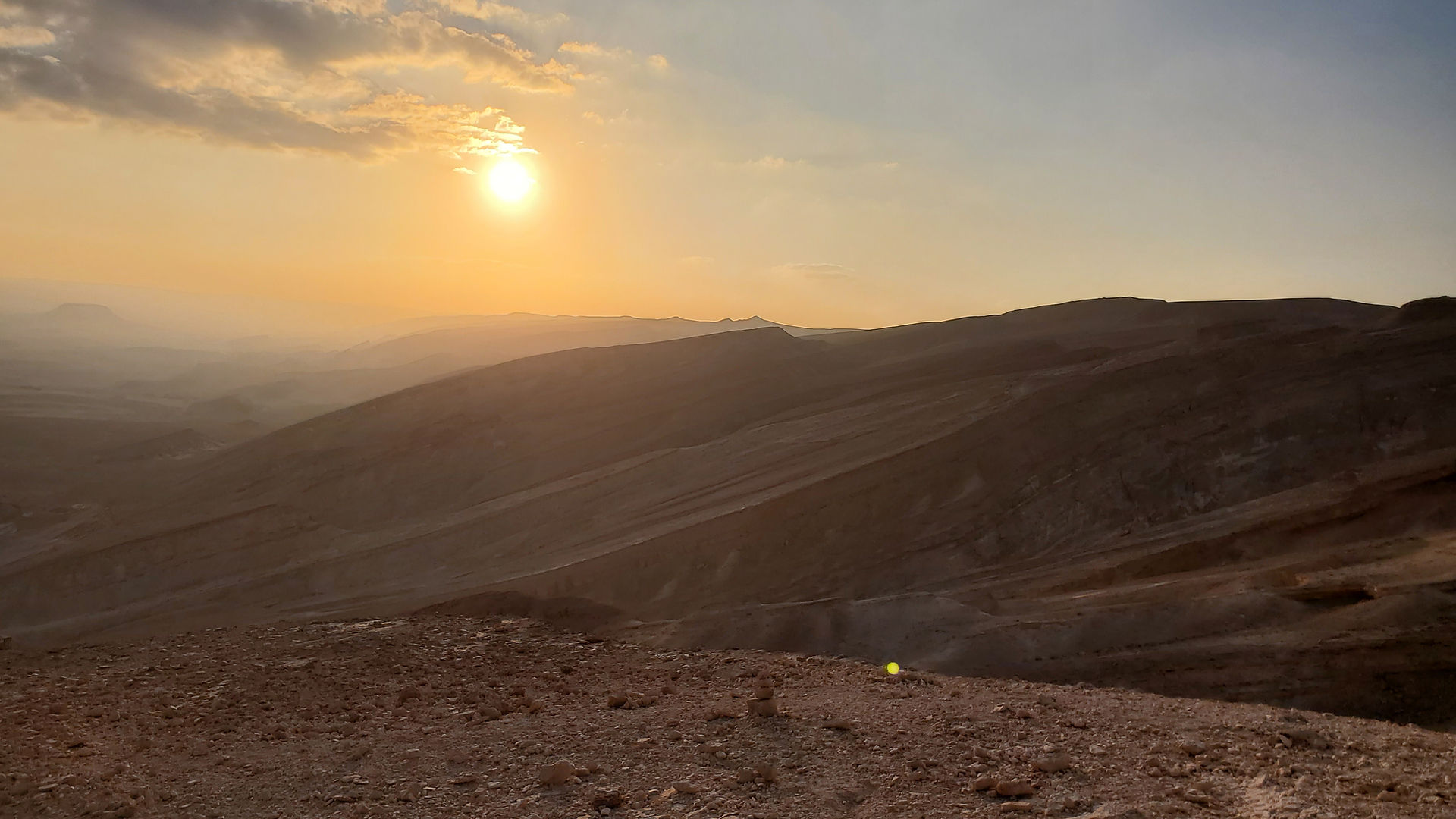 Golden sunset over the vast desert mountain range in Southern Israel.