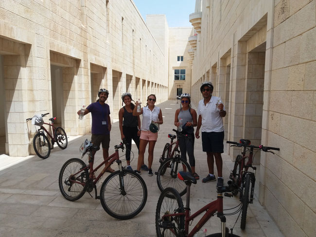 Travelers exploring Jerusalem Old City alleyways during a private guided walking tour