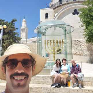 Private guide Sagi Levy taking a selfie with a group of tourists in front of the Golden Menorah (Temple Menorah) on the way to the Western Wall.