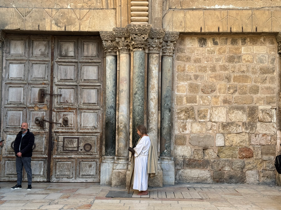 Historic wooden church doors in Jerusalem’s Old City