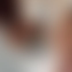 Woman adjusting her hearing aid — Topeka ENT helps patients fix hearing aids that aren’t loud enough.