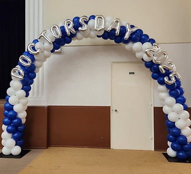 Modern balloon arch at Long Island trade show booth.