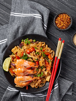 flat-lay-noodles-with-vegetables-chicken-with-chopsticks-spices.jpg