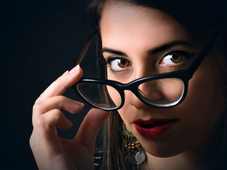 Closeup images of a woman's face wearing spectacles