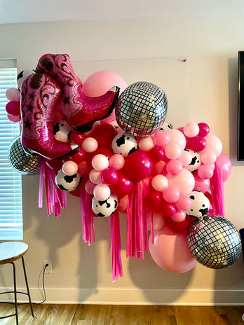 Disco Cowgirl Balloon Wall with Tassels.jpeg
