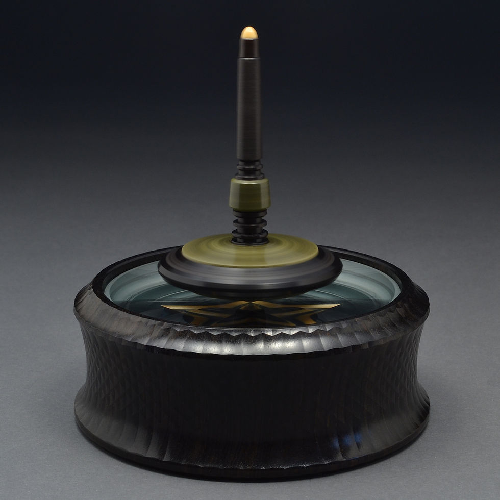 Spin Top on "Star" Ornamental Spin Station