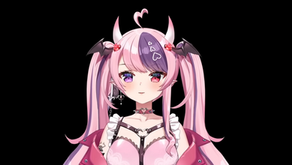 VTuber ironmouse sits against a black background. She has pink hair, reddish eyes, pigtails and horns.
