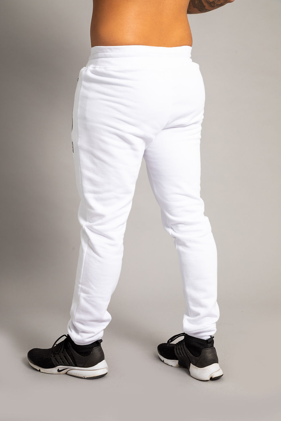 Thumbnail: Fitted track pants for men in back