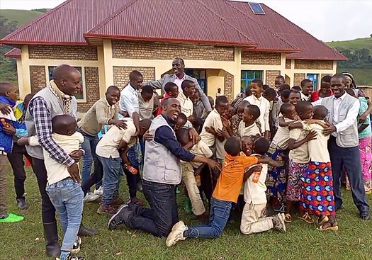 Laughing Hugging Children in front NHRC.jpg