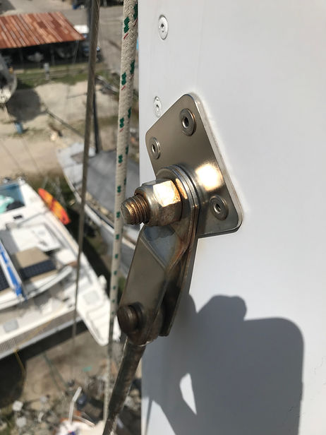 Standing rigging inspection showing stainless steel tangs with very minor corrosioin