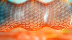 Abstract quantum wave-particle duality concept with vibrant light patterns and uncertainty