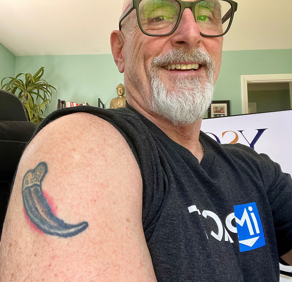 Thomas Ahern showing the tattoo of a bear claw.